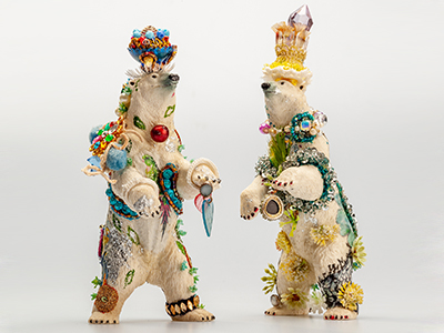 Ornately adorned polar bear statues