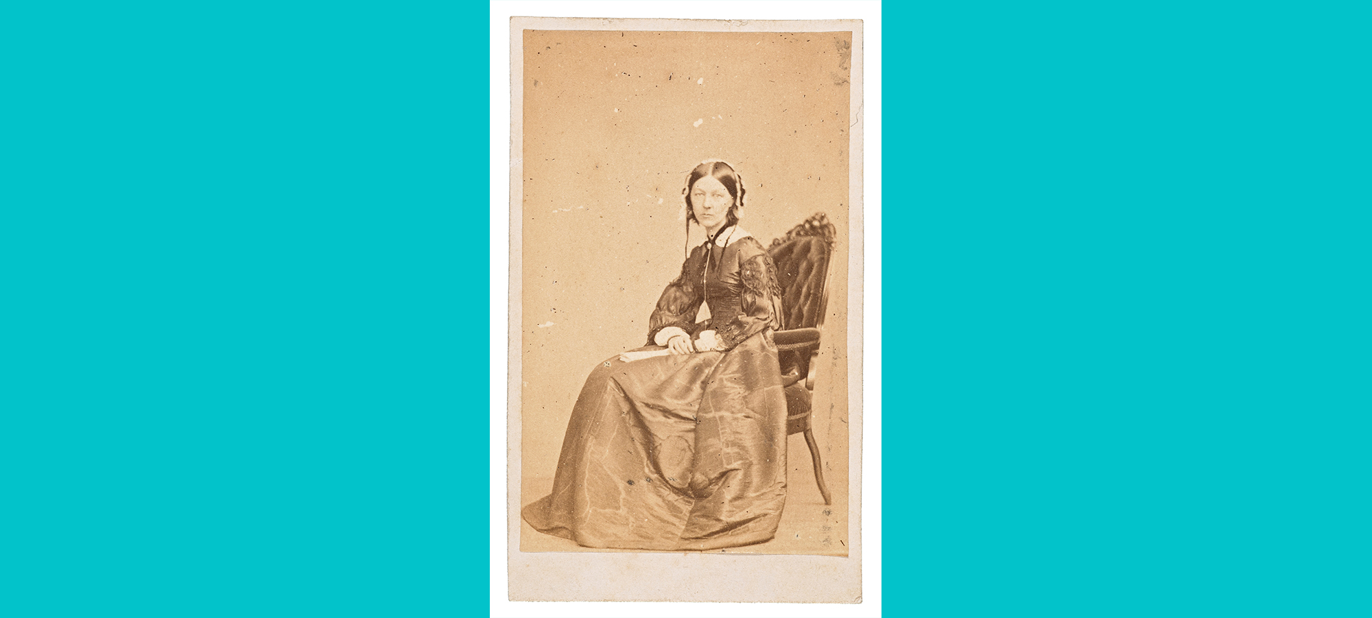 Florence Nightingale photographed seated with head turned at 90 degree angle