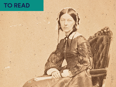 Photograph of Florence Nightingale in black and white sitting on a seat Keyword in top right corner TO READ