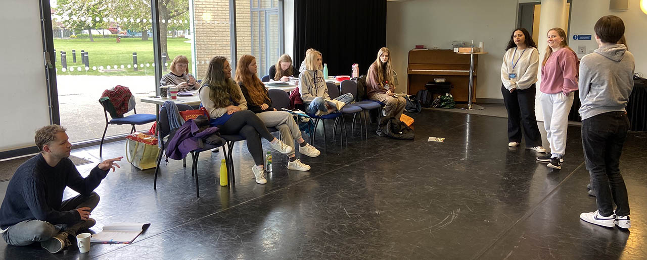 The cast of DNA in rehearsals with Nic Harvey