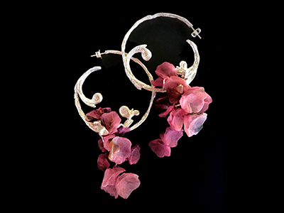 Floral gold earrings designed by Lauren Bell Brown