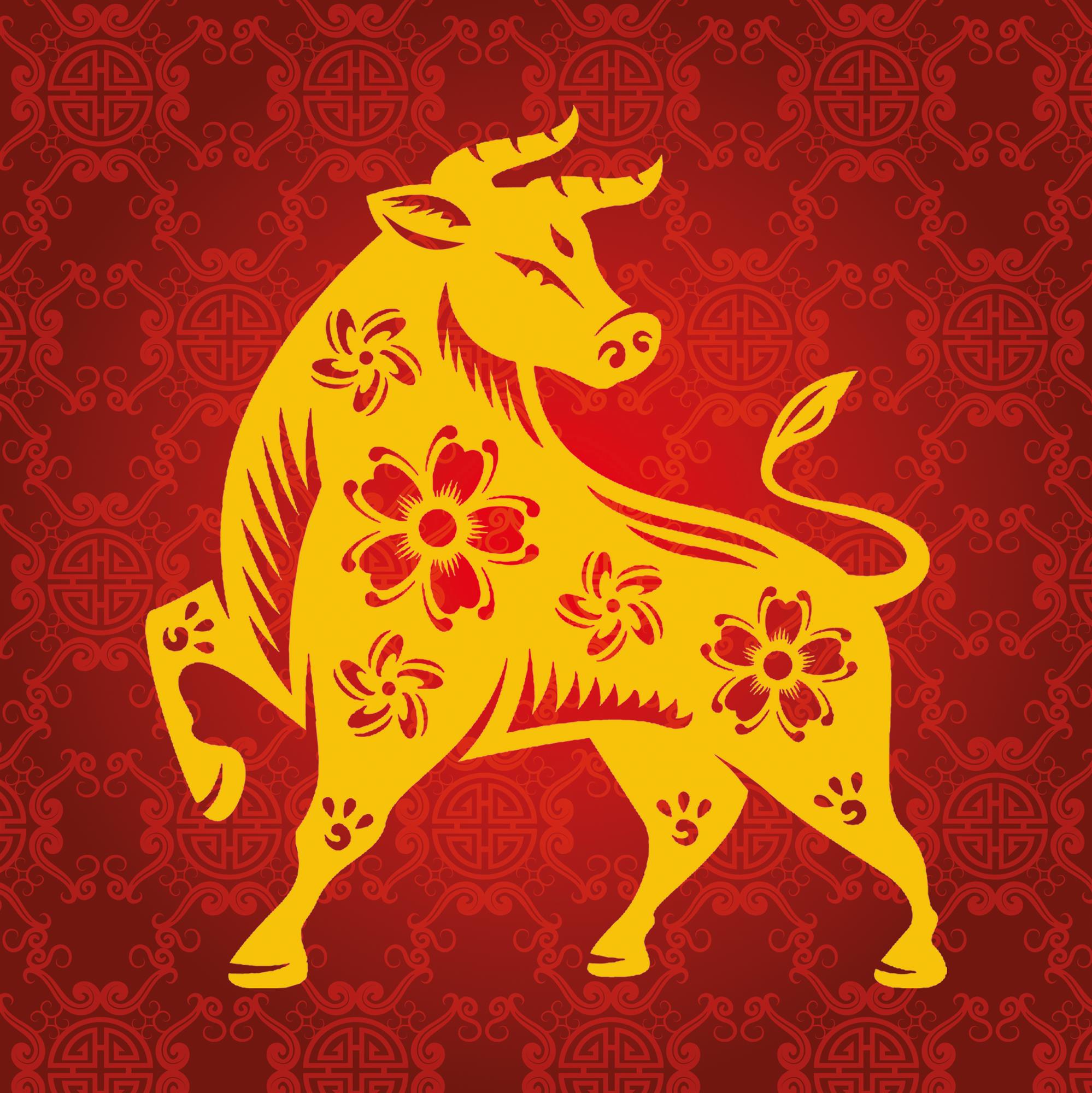 yellow ox on a red background