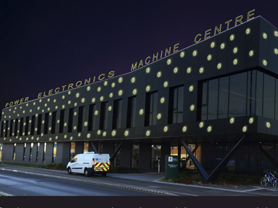 An artists rendering of a power electronics machine centre with yellow dots on it